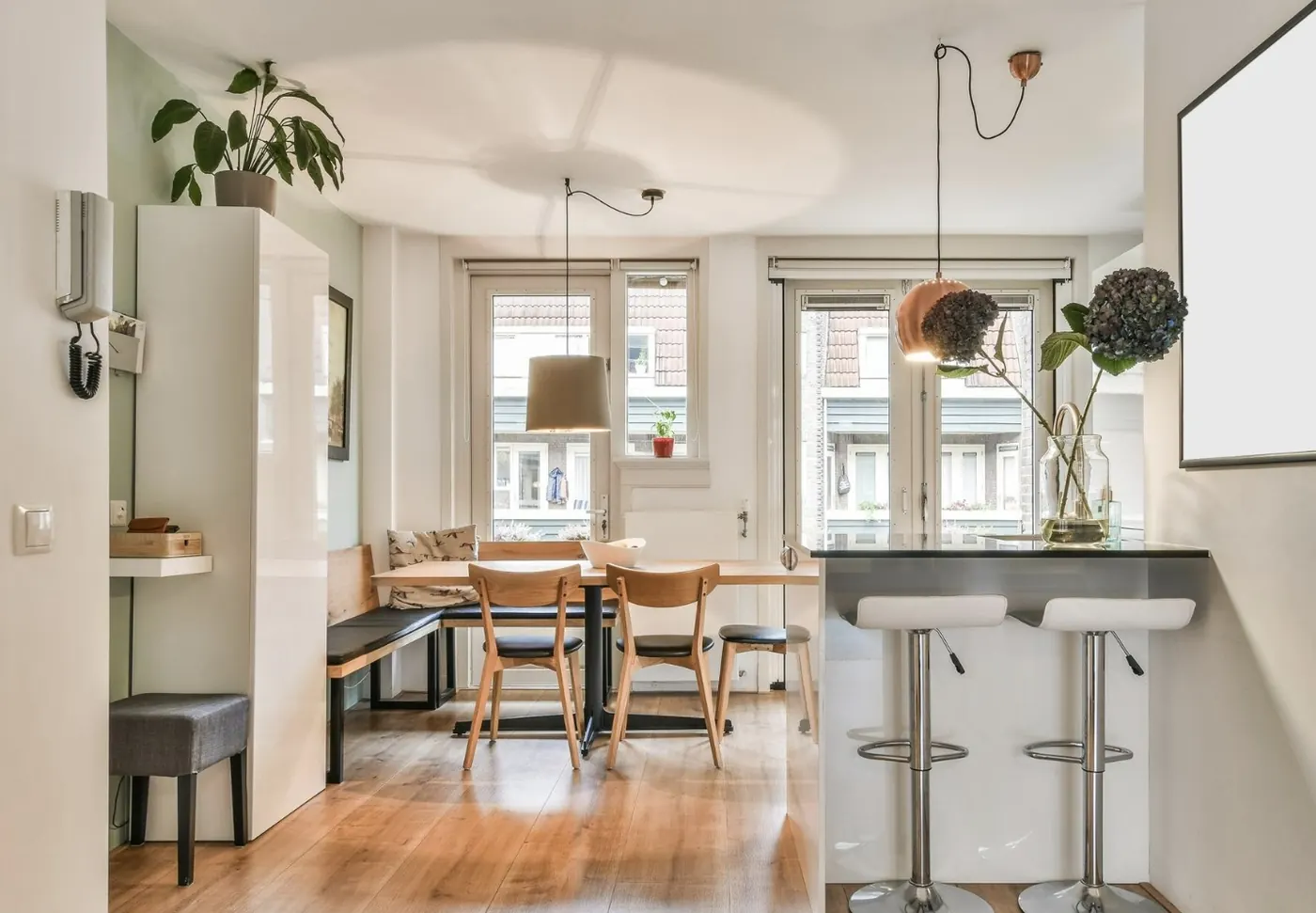 Bright, well-kept apartment kitchen and dining area